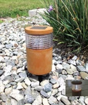 Solar Powered Cylinder Wood Grain Texture Plastic Fence Post Light. Fixed Price $45.00.