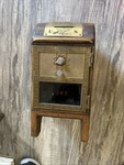 1965 National Post Office Box Coin Bank With Combination Lock. Fixed Price $160.00.