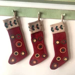 Unbranded Felt Holiday Christmas Stockings Holly Berries Primitive Red Set Of 3. Fixed Price $32.99.
