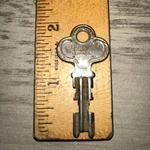Antique Key Eagle Lock Co. #BU112 Flat Unique Shape. Fixed Price $20.00.