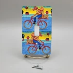 Whimsical Light Switch Cover Plate Dog Cat Riding Bicycle Paperwings Studio. Fixed Price $12.00.