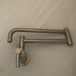 Signature Hardware Ravenel Retractable Wall-mount Pot Filler Stainless Steel. Fixed Price $74.00.
