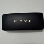 Versace Designer Eyeglass Clamshell Case - Black With Gold Letters. Fixed Price $16.20.